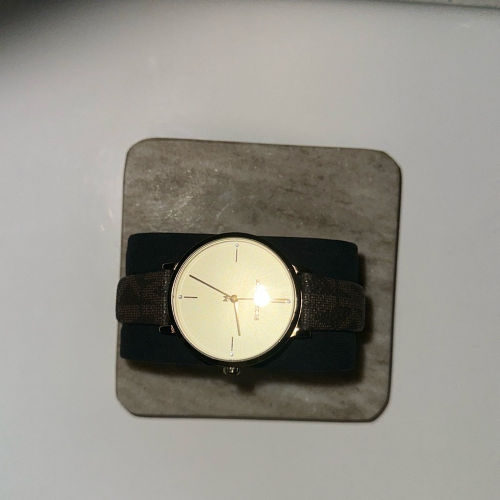 Women’s signature brown Micheal Kors Watch